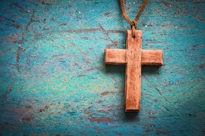 Wooden cross on a necklace